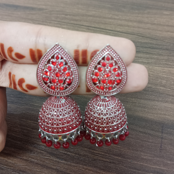 Oxidized Silver Jhumka Earrings with Red Bead and Diamond Embellishments