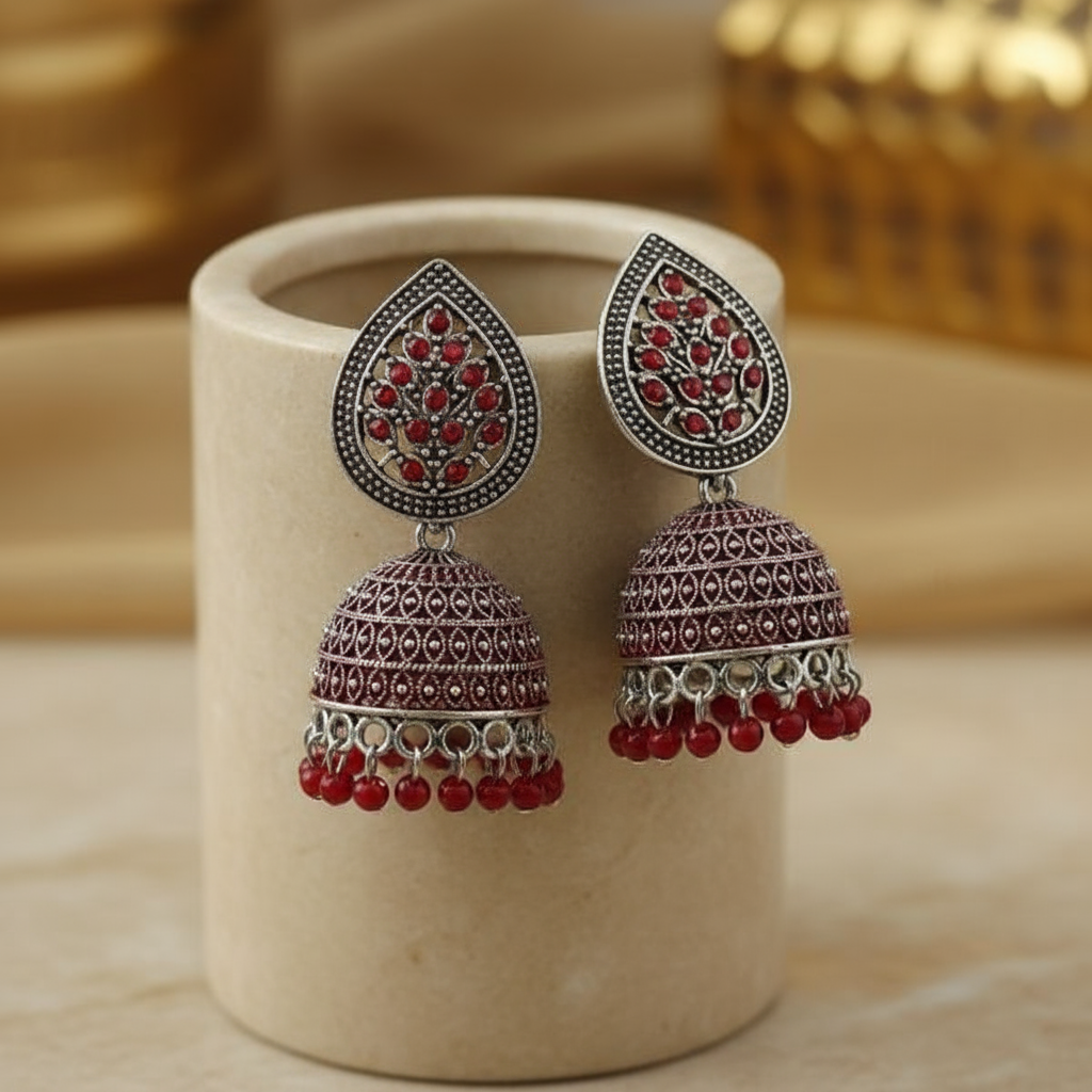 Oxidized Silver Jhumka Earrings with Red Bead and Diamond Embellishments